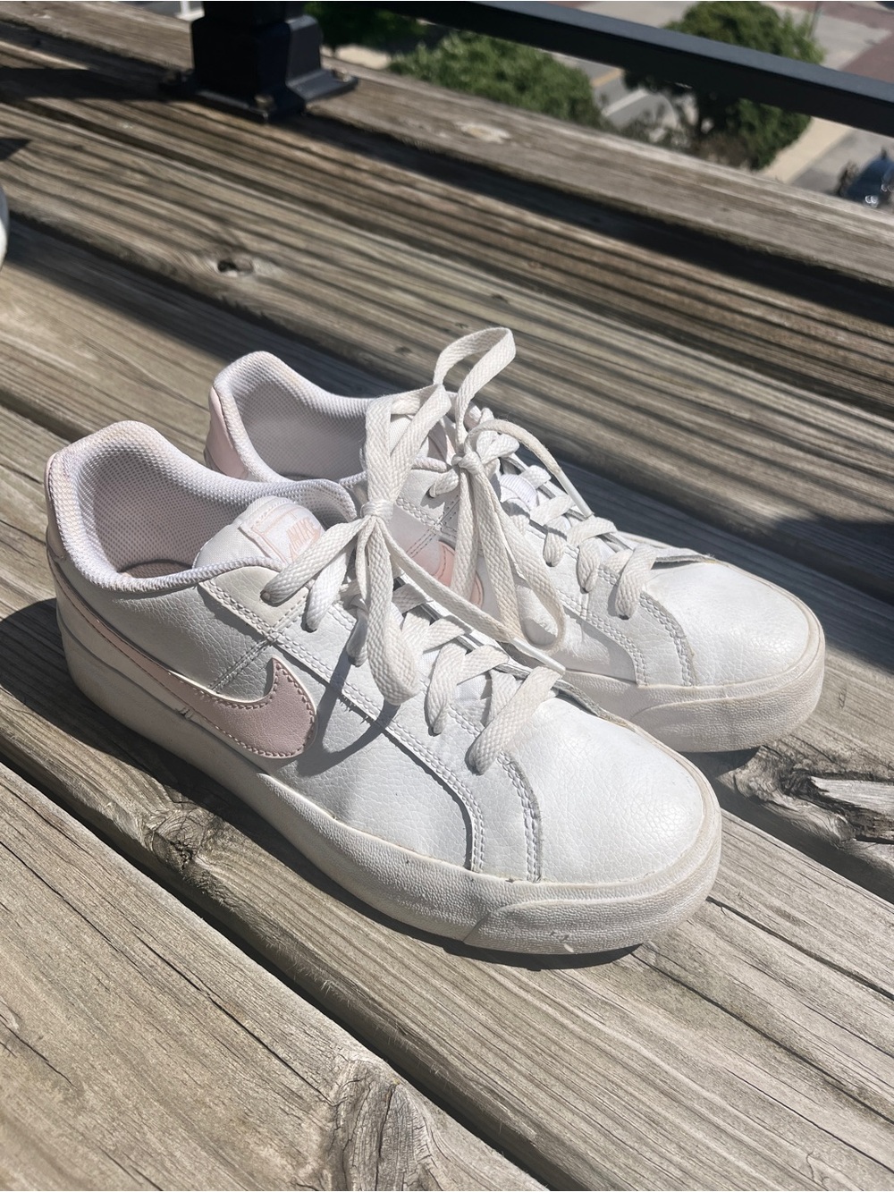 White Nike Court Royale Sneakers with Pink Swoosh